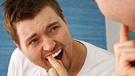 علت لق شدن دندان و درمان آن